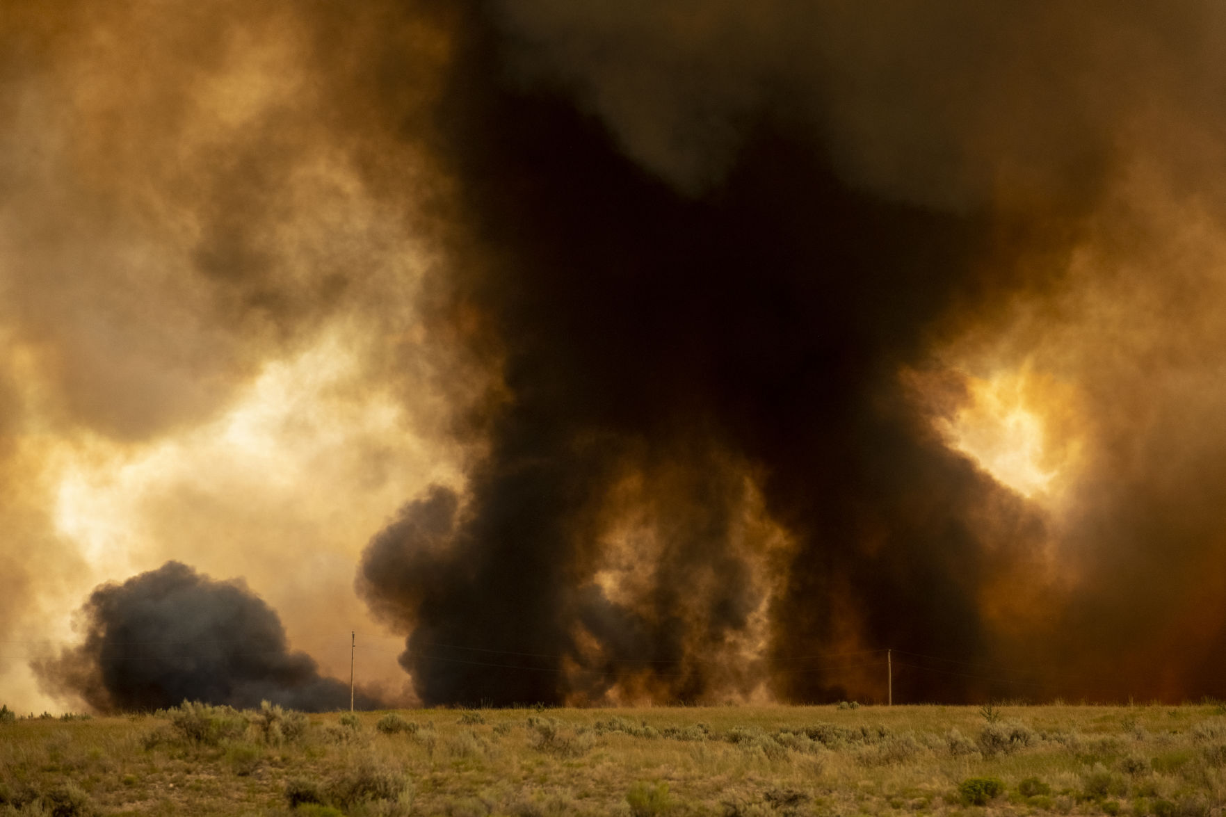 Wildfire burns near Declo